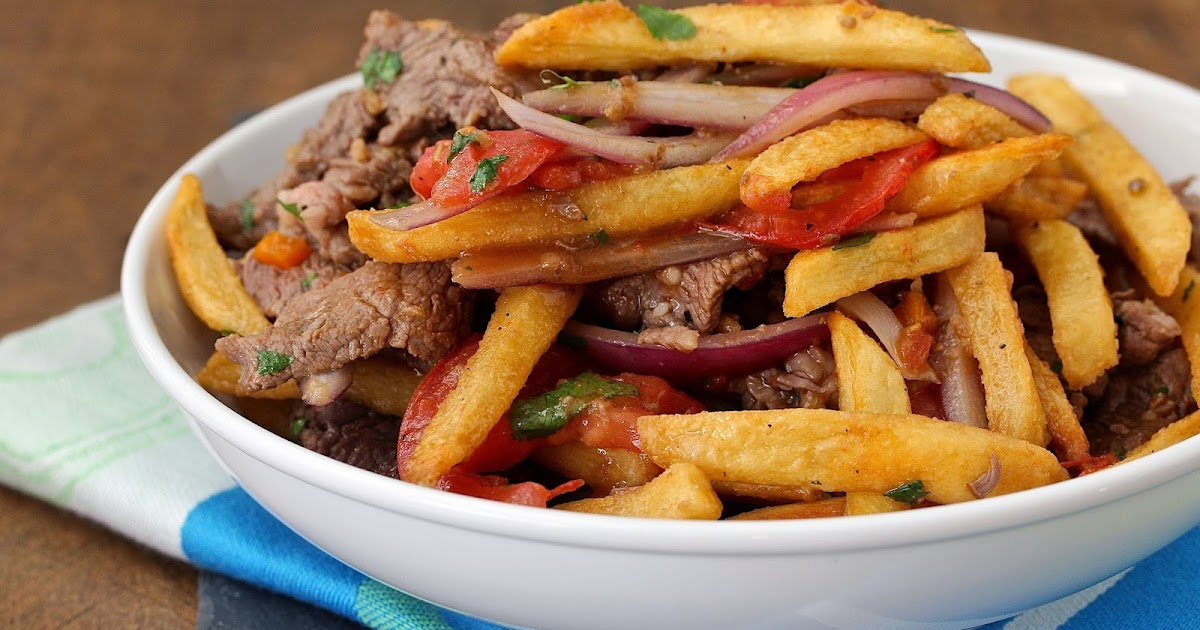 Lomo Saltado Mastering the Chinese-Peruvian Stir-Fry with Tender Beef, Blistered Veggies, and Crispy Fries