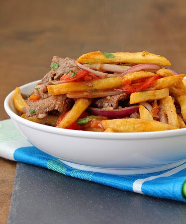 Lomo Saltado Mastering the Chinese-Peruvian Stir-Fry with Tender Beef, Blistered Veggies, and Crispy Fries