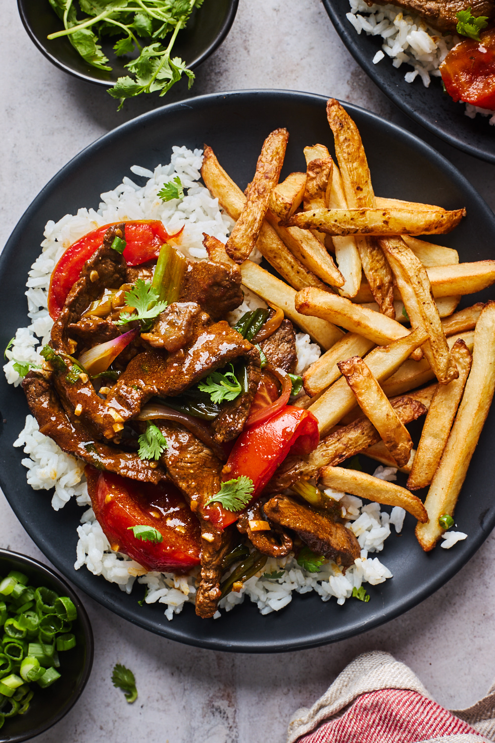 Lomo Saltado Mastering the Chinese-Peruvian Stir-Fry with Tender Beef, Blistered Veggies, and Crispy Fries